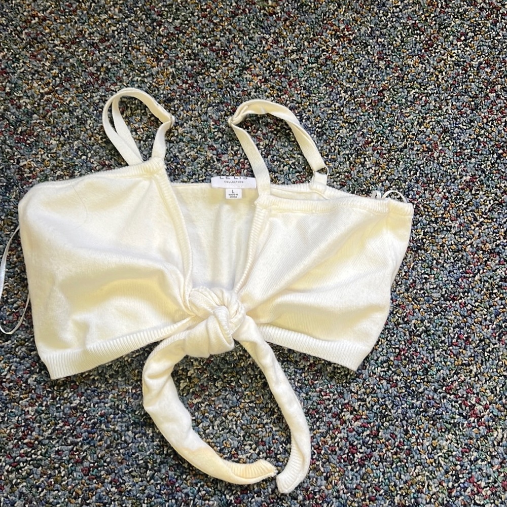 Le Lis White Wrap Top. Size Large. Small stain.